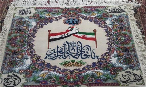 هنرمند خویی تابلوفرش دوستی ایران و عراق را بافت
